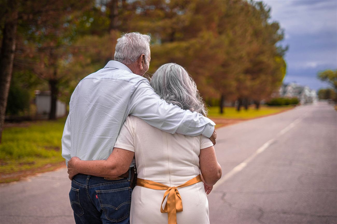 Elderly couple reviewing final expense coverage together
